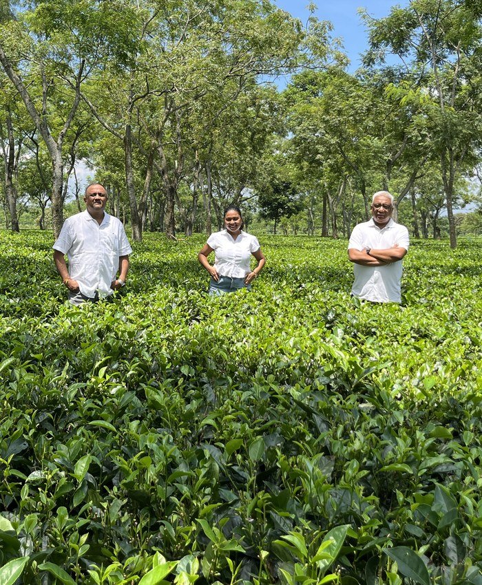 Two generations of the Hatipoti family in the garden