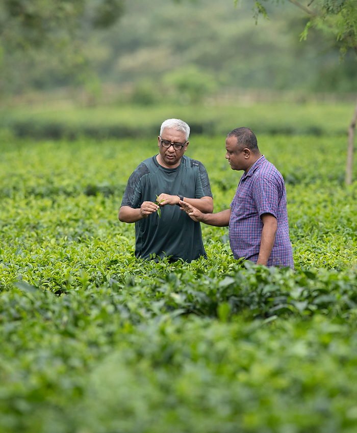 Two generations of the Hatipoti family in the garden